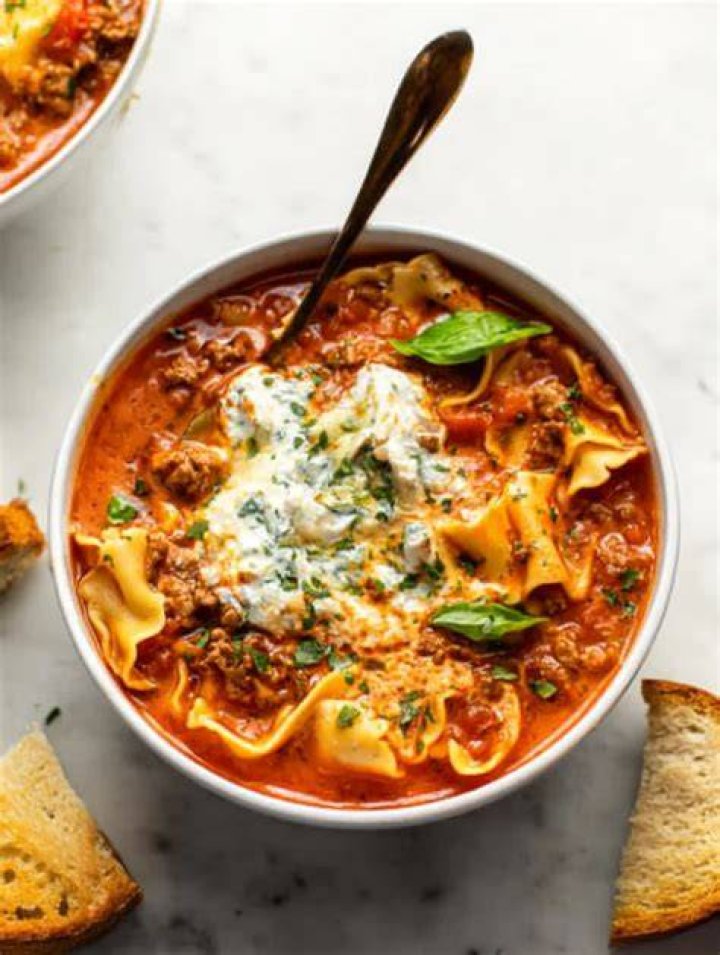 Lasagna Soup topped with ricotta cheese